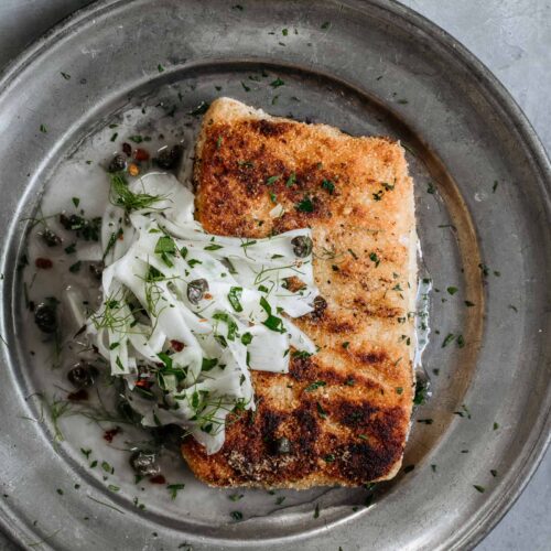 While almond crusted fish piccata may bear little resemblance to the red-and-white checkered classic, it’s fresher, nuttier & keeps all the familiar flavors.