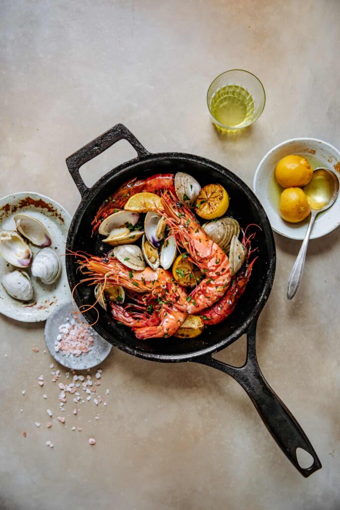 Cast Iron Roasted Colossal Prawns with Clams and Gremolata
