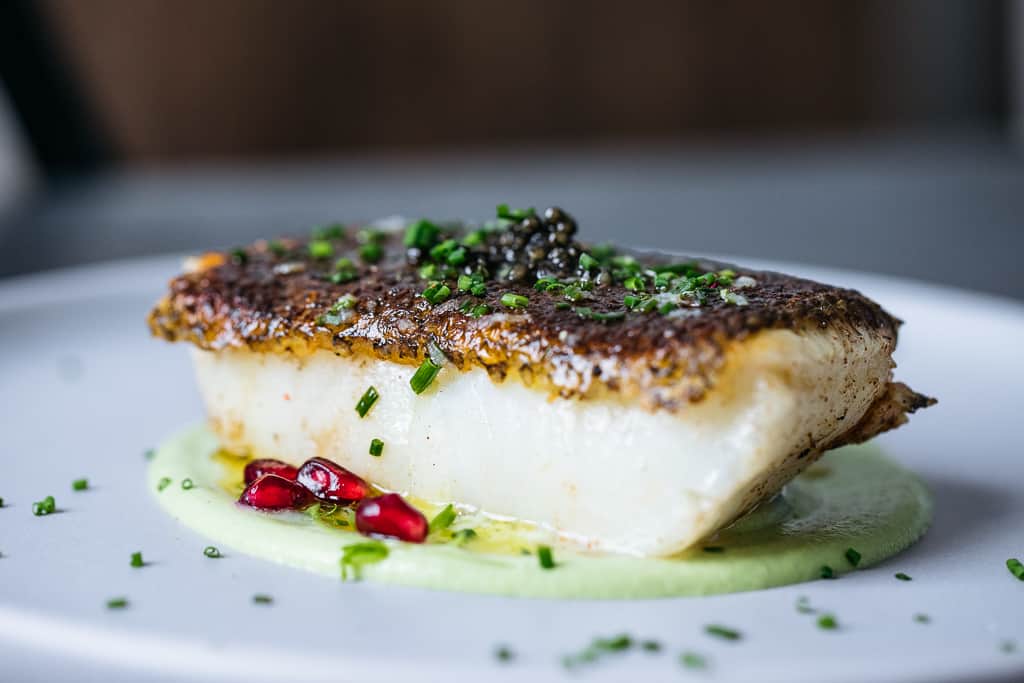 Pan-Roasted Sea Bass with Edamame, Chive, Pomegranate & ROE Caviar