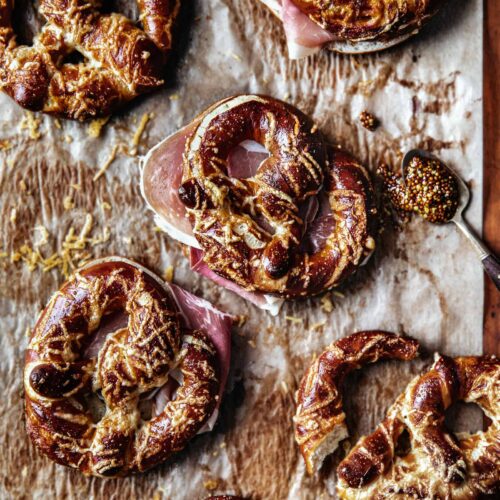 Parchment lined with Soft Pretzels with Speck and Gruyere