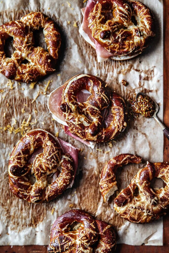 Parchment lined with Soft Pretzels with Speck and Gruyere